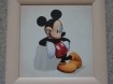 Drie schilderijtjes met verschillende Walt Disney-figuren.