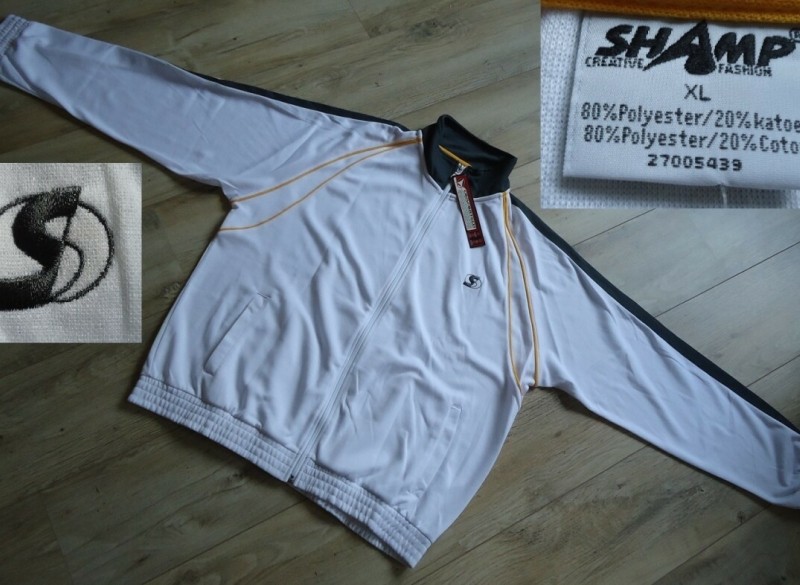 Te koop nieuw wit trainingsjack van Shamp (maat: XL).
