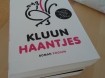 Te koop het boek Haantjes van Kluun (uit 2011).