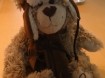 Te koop pluche knuffelhond met sjaal en muts (hoogte: 25 cm…