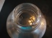 Te koop een hoge glazen vaas (hoogte: 41 cm).