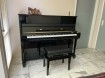 Zwarte hoogglans piano