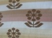 Te koop beige vintage deken met bloemmotief (237 x 213 cm).