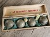 Petanque ballen in houten kist 