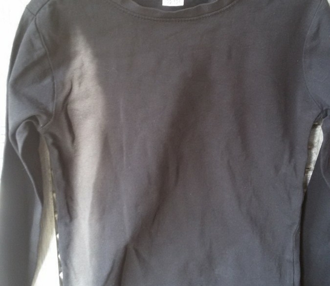 Zwart thermoshirt maat 140/146